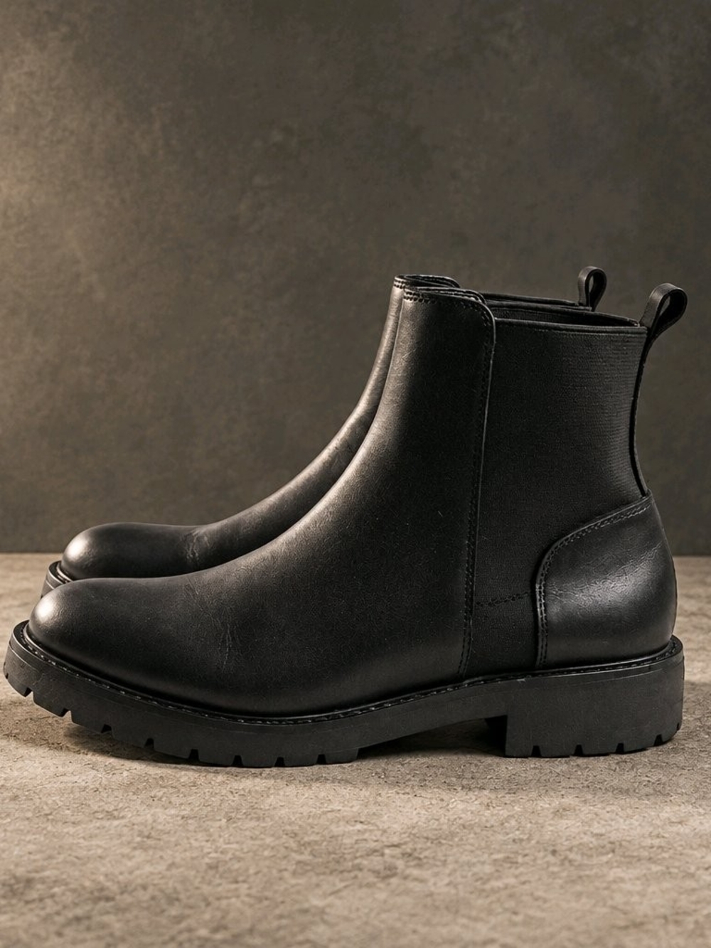 Steve Madden Black Leather Chelsea Lug Booties